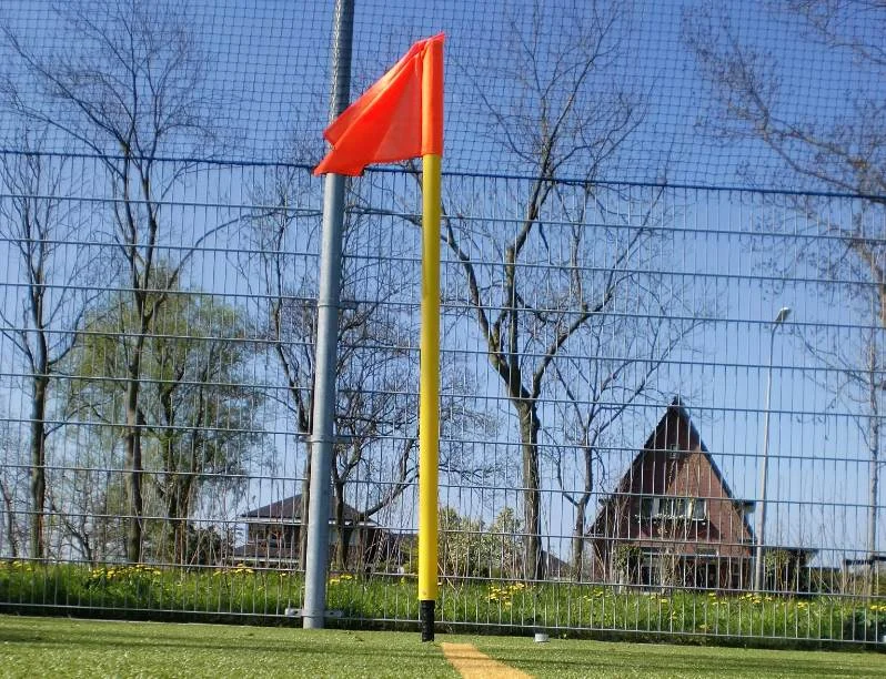 Corner flagpole with spring