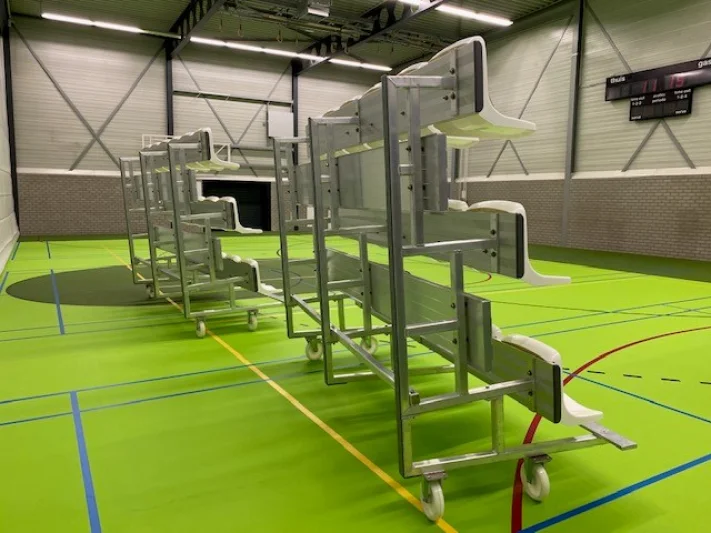 Mobile and tilting grandstands for sports hall