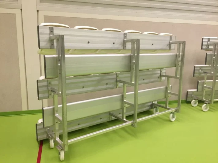 Mobile and tilting grandstands for sports hall