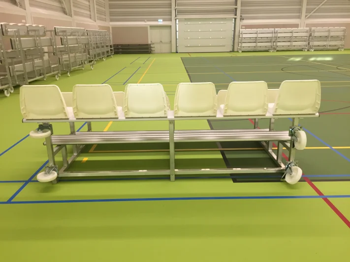Mobile and tilting grandstands for sports hall