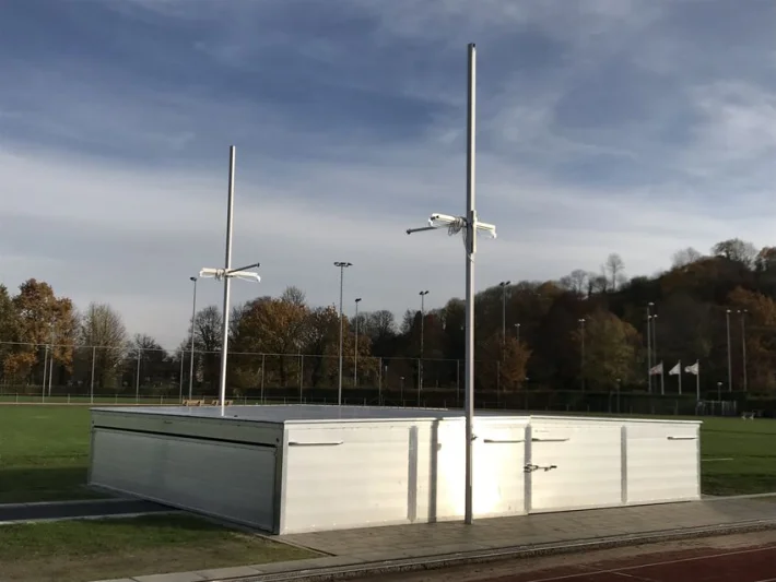 Overkapping atletiek voor landingsmat