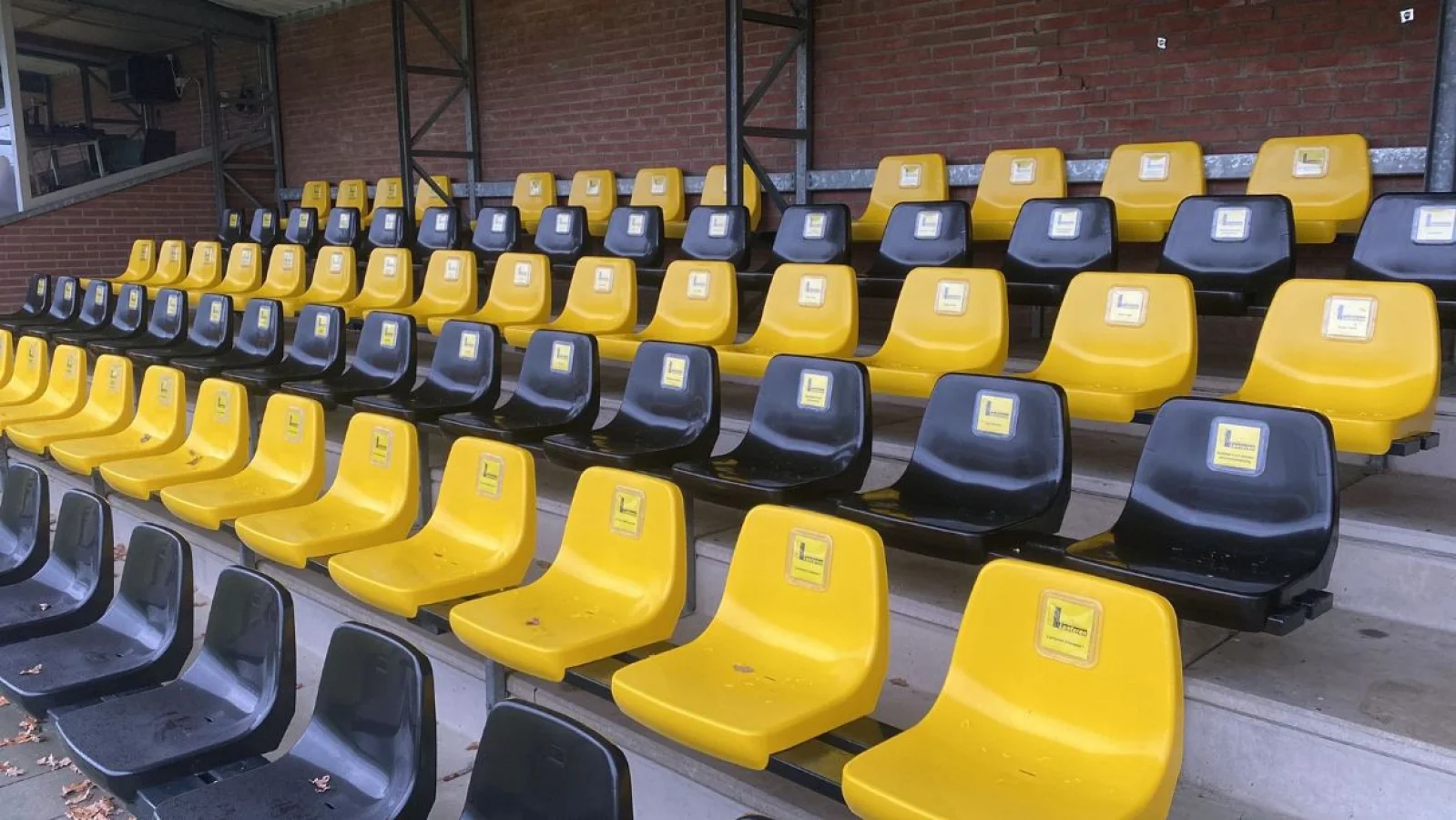 Stadium seats with seat advertising at VV Lunteren