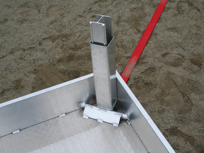 Mobile ground socket frame for beach badminton posts