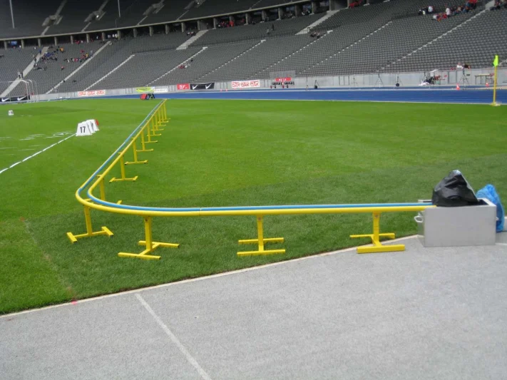 Return trough for shot puts